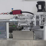 Servo control thickness adjustment